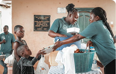Volunteers distributing clothing